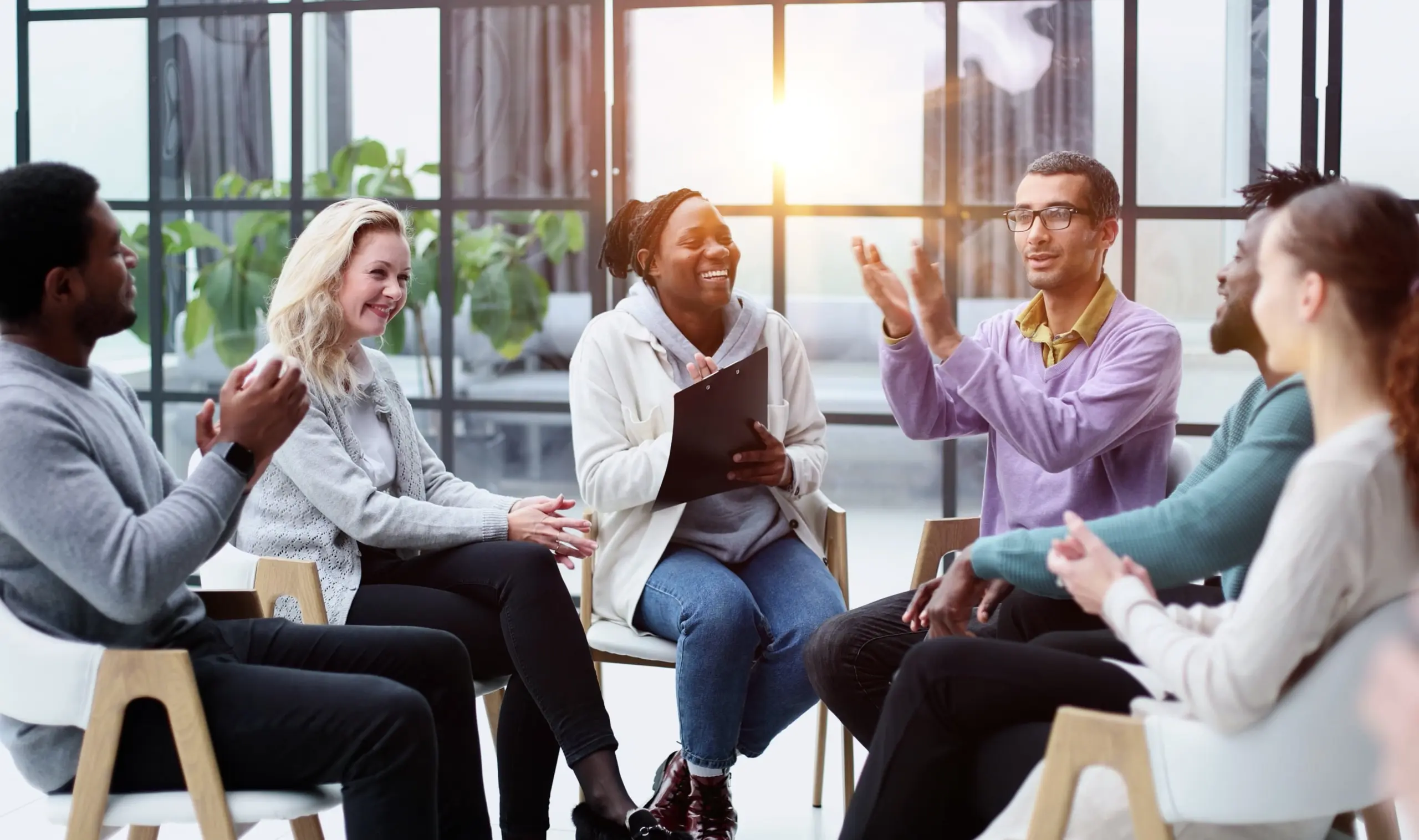 Group therapy session supporting active recovery and personal growth