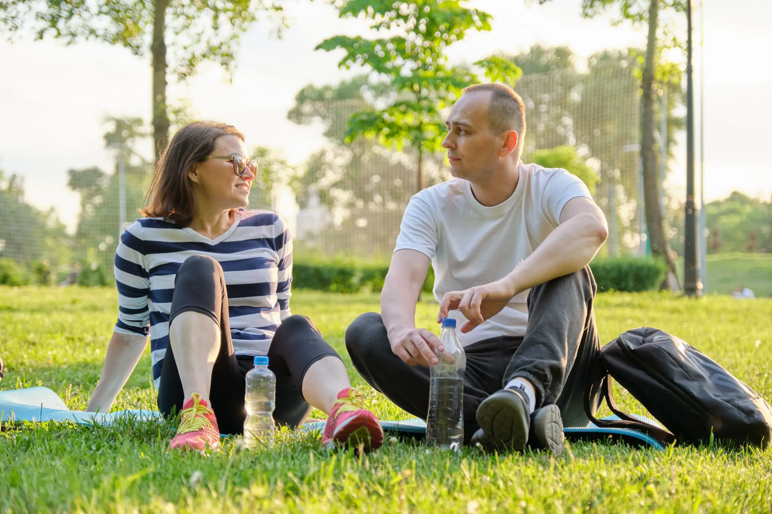 Couple discussing their relationship while navigating recovery together