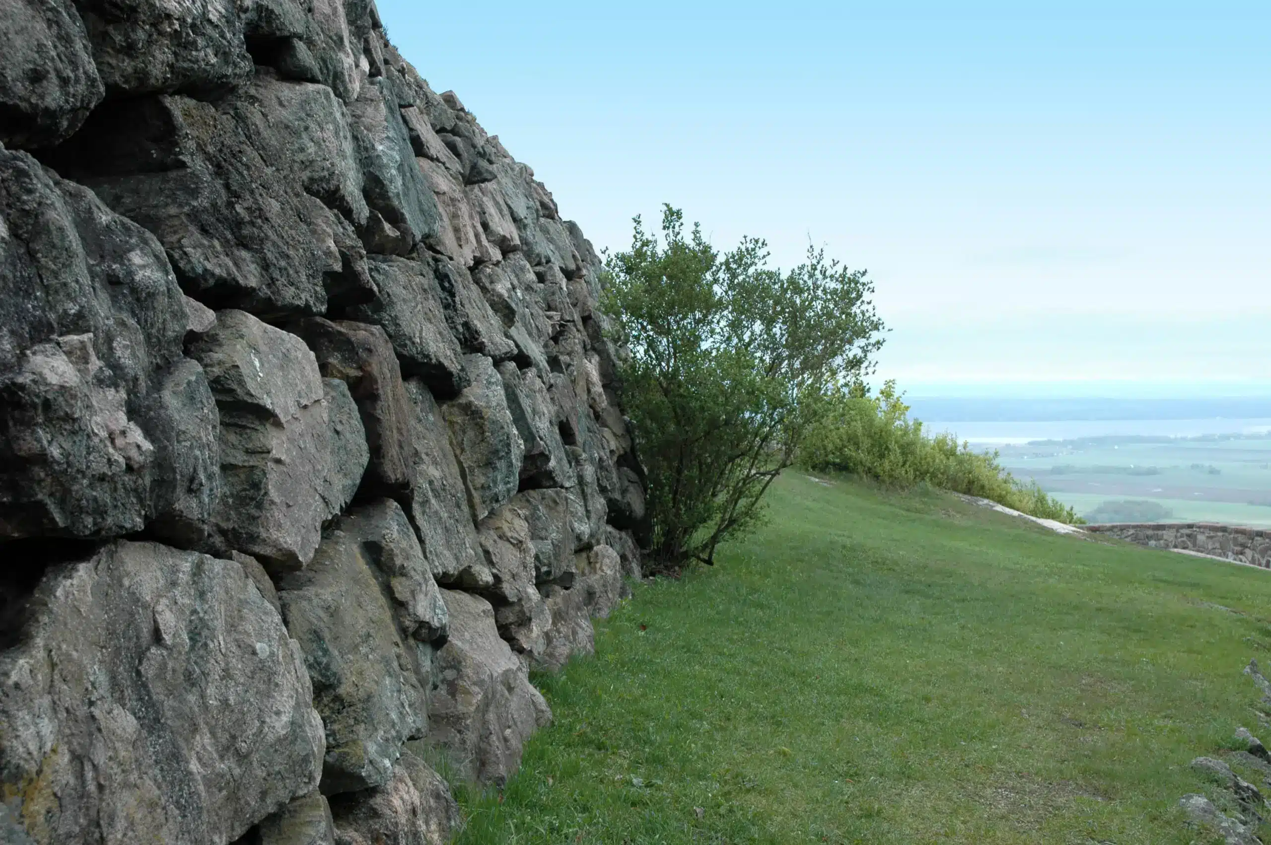 Image of a strong stone wall being built, symbolizing stable and consistent effort in repairing reputation Image of a strong stone wall being built, symbolizing stable and consistent effort in repairing reputation