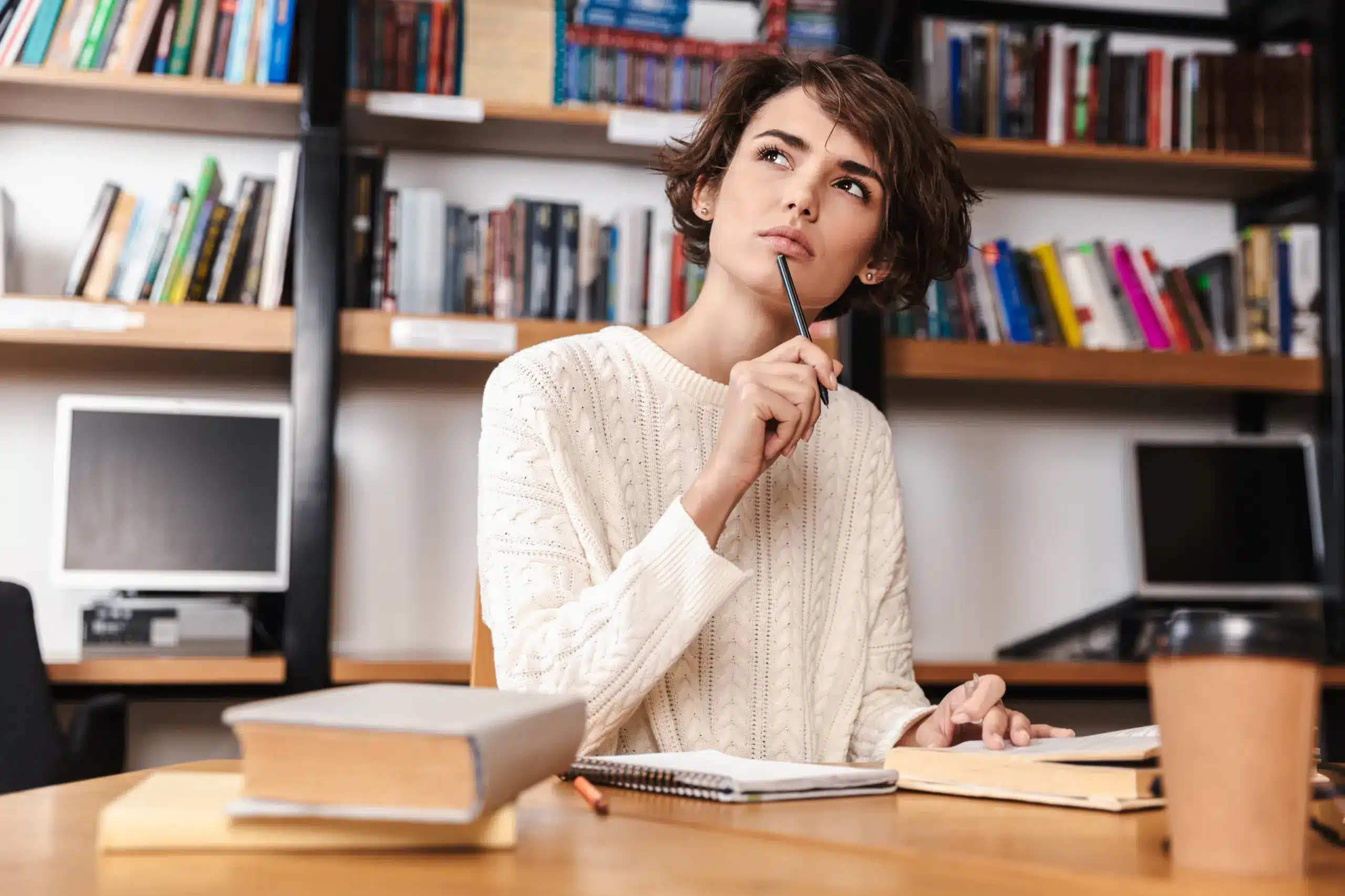 A student in a peaceful Leona Valley setting working on a university application.